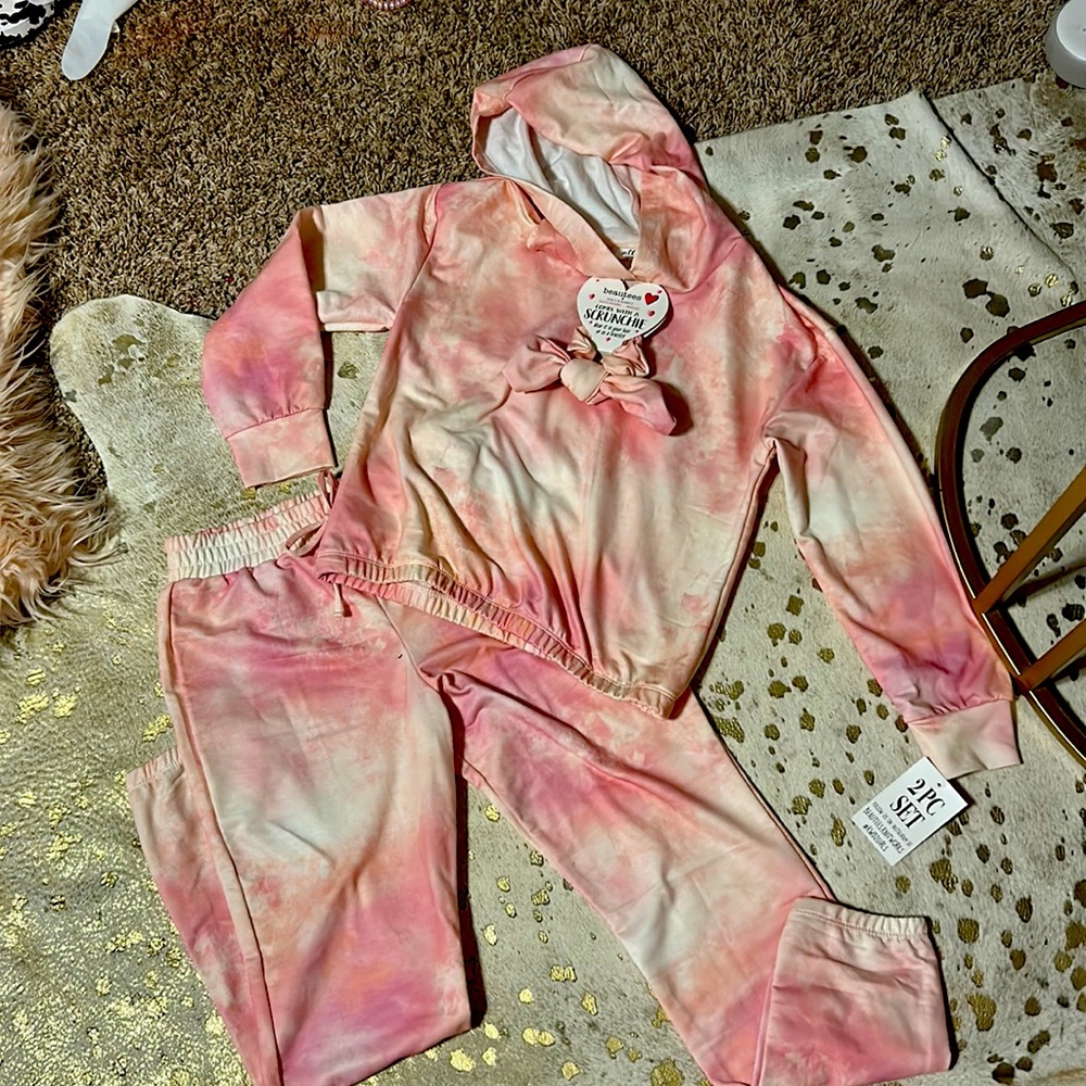 I am selling a set of pink and white tie-dye pants and hoodie with a scrunchie